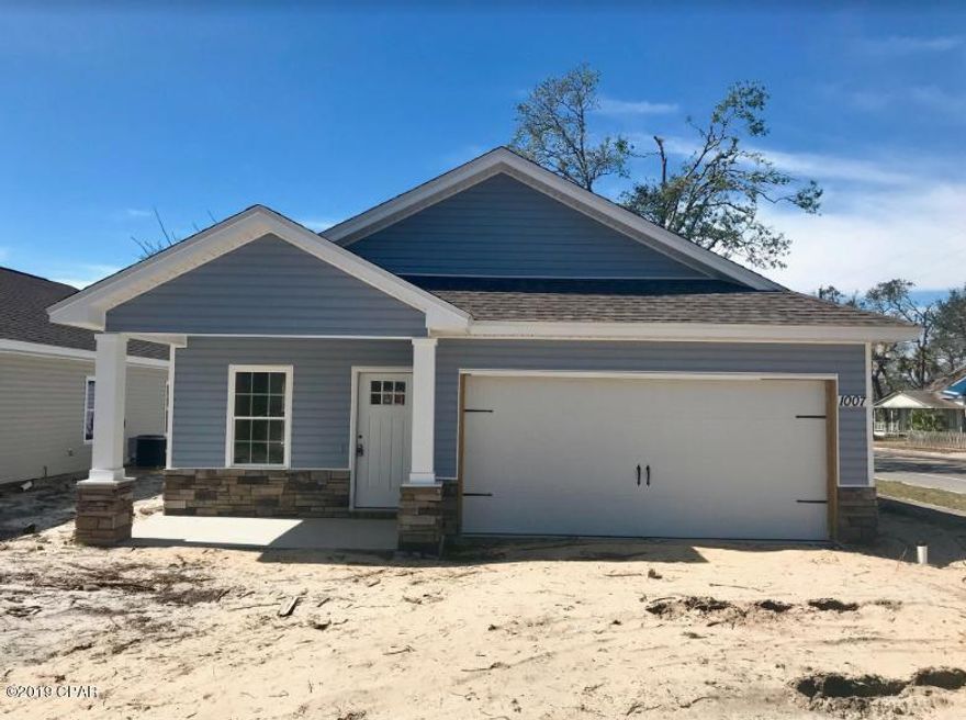 PANAMA CITY/ST.ANDREWS-NEW CONSTRUCTION-3 BED/2 BATH-COVE AREA-easy access to Panama City's main shopping corridor, Tyndall AFB, and the Naval Coastal Systems Base. Interior of home offers upgraded lighting fixtures, super durable laminate wood flooring in living room and dining room, kitchen with locally built cabinets, quartz counter tops, large island, unique accent lighting and stainless steel appliances, large master suite with separate shower, double vanity sinks and walk-in closet, recessed lighting.Exterior features stacked stone accent, two car garage, fully sodded yard with sprinkler system, covered porch. All listing info should be verified.All materials and finishes are subject to change