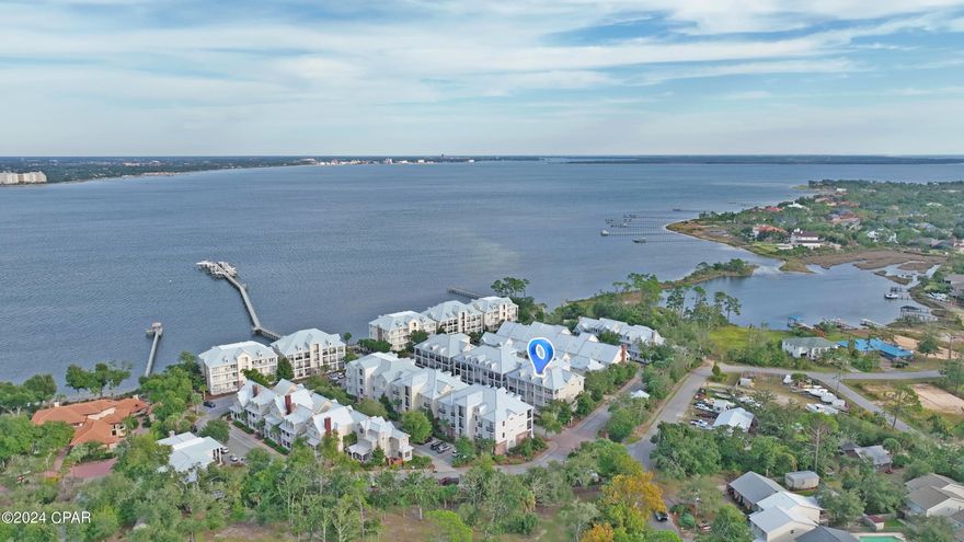 ''Under Contract, Seller Will Consider Back Up Offers''  Welcome to Waterhaven! Beautiful top floor unit with 9ft ceilings offers 2-bedroom, 2 baths and a spacious loft with a 6' x 9' storage area that can be accessed from the loft. The condo has a gourmet kitchen with granite counter tops, viking 6 burner gas range, sub zero refrigerator, custom cabinetry, wet bar w/wine cooler. Brand new carpet in both of the bedrooms and loft. Easy elevator access at the rear entry door. The gated Bay Front community of Waterhaven is conveniently located for shopping, dining, entertainment and the white sandy beaches. The many amenities include a dock with marina for fishing or relaxing in the evenings, community pool, kayaking, paddle boards, club house, fitness center, theater and fenced boat storage across the street. Come visit today!