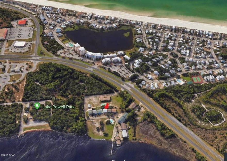 This amazing property has it all. On Lake Powell with a boat ramp, access to the Gulf of Mexico by water, minutes to 30A and Panama City Beach. This location is prime. The interior has been kept in good condition and has only been used by family. 2 pools, boat launch with decks on multiple levels... Why don't you make this amazing spot your home away from home, today!