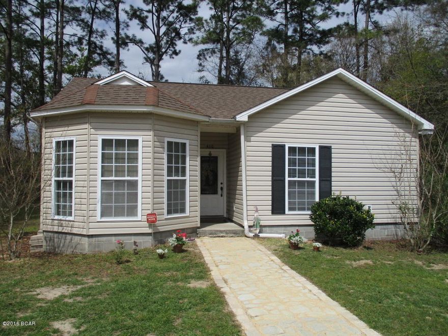 Cute and charming 3br/2ba home with a country feel in the middle of Lynn Haven! When you walk in you will notice right away the quality of this home, with it's arched doorways, bull-nose corners,crown molding and comfortable living areas. Home has a large kitchen/dining area with an open feel, stainless appliances, stylish back-splash and counters over tile flooring. The main living area opens up to the back patio, and the master bedroom with it's bay style window is bright with lots of light. At over a quarter of an acre, there's plenty of yard to play in, add a garage on, or just to landscape and enjoy! Even though the home has a country feel to it, it is very close to schools, shopping and Cain Griffin  recreational Park with playground. Great home in a great location!