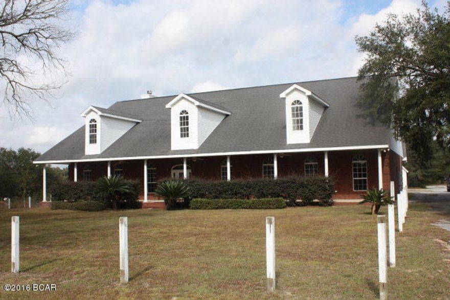 Magnificent home on River Lake in Southern Washington County with 13.5 acres, some fencing and horsebarns . This country 6 BdRm/3.5BA home with 4,683 H&C sq. ft. has lots to offer with high ceilings, crown molding, doublesided fireplace faces living and diningroom, cabinets galore in kitchen with solid surface countertops, extralarge gas stove, beautiful staircase going up to second floor with a study/computer area, oversized rec room and a half bath. Master bedroom has a seperate sitting area, bath with whirlpool and seperate shower and sinks. All bedrooms have extralarge closets. Front and back porches across home. Paved driveway. There are three parcels that make up this sale all three have its on address. This is being sold AS IS.