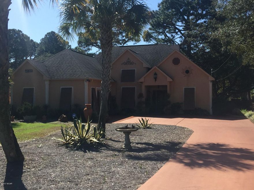 This immaculate home is located in the east end of Panama City Beach.  High ceilings, lots of curved walls, fireplace, separate dining room, breakfast nook, and 3 full baths!  Landscaped back yard, walk through green house, and a storage house.  Allergen duct work through the AC unit.  

This home is move in ready!