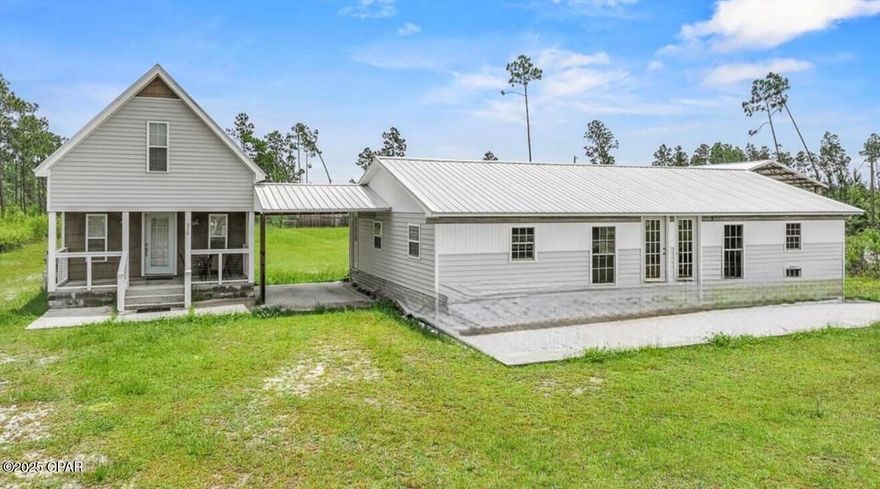 TONS OF POTENTIAL!! Charming 1 bedroom/1 bathroom cottage with a versatile loft perfect for studio, office space or guests and only five miles from the white sandy beaches of the Gulf or .5 mile to the boat ramp at the Intracoastal Waterway ! Whether you're enjoying a quiet morning coffee or hosting a weekend with friends, the open living area and welcoming front porch set the stage for relaxed coastal living. This property comes with an exciting bonus: a second structure already in place, along with plans for an accessory dwelling-ideal for building a 2-bedroom,2-bath addition.   It's an incredible opportunity to expand, invest, or create a multi-generational setup. Build out the additional home and enjoy rental income, a guest cottage, or private quarters for extended family. Located just minutes from downtown Port St. Joe. You'll love the peace and quiet of this tucked-away street while still enjoying easy access to schools, grocery stores, and local events. Whether you're looking for a starter home, vacation getaway, or investment property with room to grow. Call today for your very own private tour !