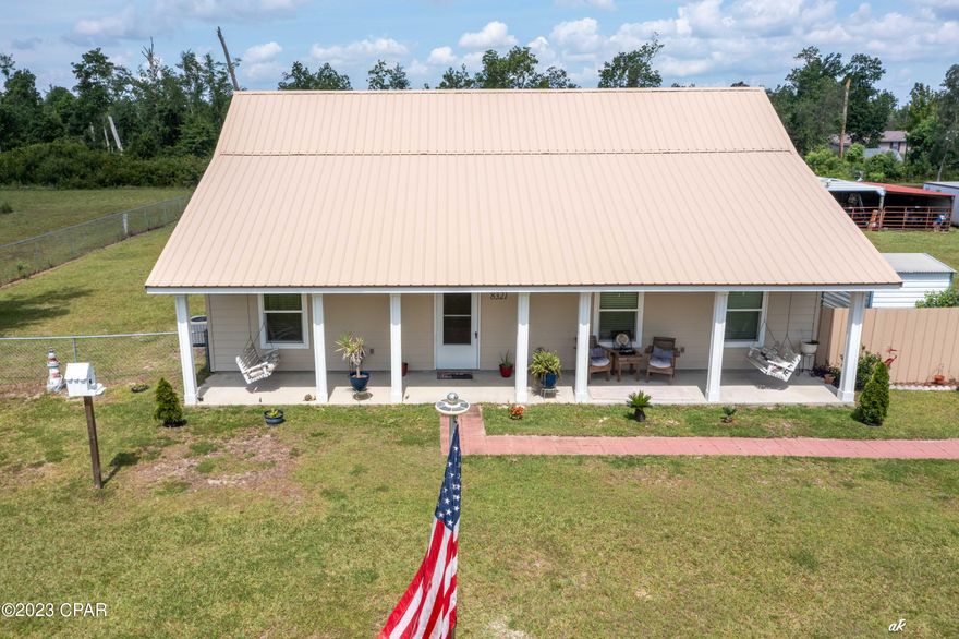 UNDER CONTRACT WITH CONTINGENCIES; SELLER ACCEPTING BACKUP OFFERS.
Newly constructed (2020) ranch home located in north Panama City / Youngstown.
It is rare to find 1.72+/- acres with multiple outbuildings and new construction in Bay County.
Meticulously maintained with metal roof, all custom cabinetry, custom backsplash, LVP flooring, recessed / custom lighting, stainless steel appliances, solid surface countertops, and soft / neutral paint colors.  One of the most prominent features of this newly constructed home are the open porches on the front and back of the home.  The owner built an open-air porch with custom brick pavers on the back of the home for entertaining.
Also, the home comes with a 35 foot x 15 foot pole barn ample for covering construction equipment, lawn equipment, or even additional vehicles.  There is ample room on this 1.72+/- acre lot for RV parking.  Home is on a private well and septic tank.
Come see this amazing home located on large acreage in private northern Bay County.