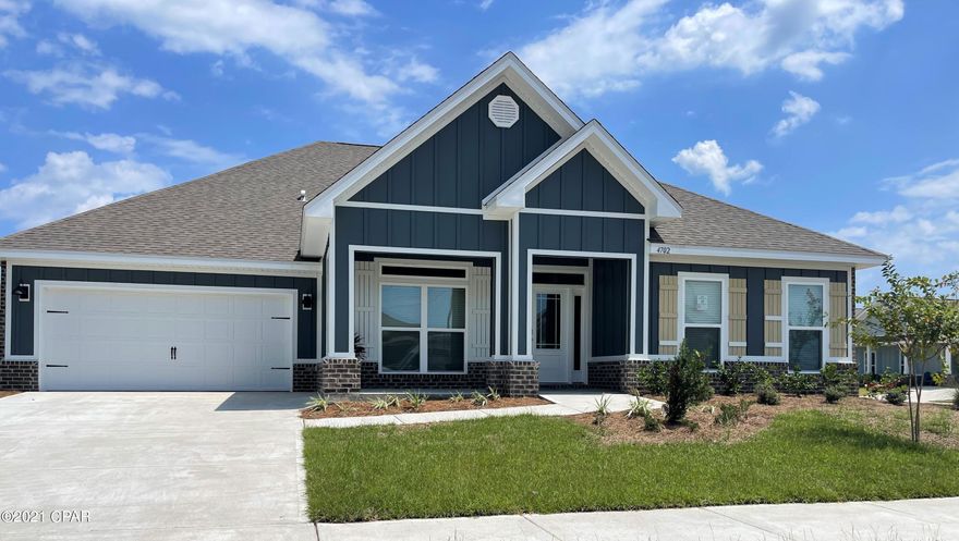 The McKenzie is a 5 bed, 3 bath home located in Titus Park! This home has a large covered front porch and as you enter, the entryway divides the study from the formal dining room. Down the hall is the kitchen featuring a large pantry, an island and counter bar that overlooks the breakfast area and family room. Bedroom 1 features separate access to the back covered porch as well. The main bath features a linen closet, dual sinks, a separate shower and large tub as well as a large walk in closet. Interior features include: granite countertops in the kitchen and bathrooms, 9' ceilings, orange peel textured walls, shaker styled cabinets, and LVP flooring through the home with carpet in bedrooms. A standard Smart Home package includes a KwikSet keyless entry, Skybell doorbell, automated front porch lighting, an Echo
Dot device, and Quolsys touch panel which can be integrated to control your lighting, thermostat, front door and so much more.
A builder 10 year structural warranty is also included.

Pictures, photographs, floor plans, elevations, features, colors and sizes are approximate for illustration purposes only and will
vary from the homes as built. Home and community information including pricing, included features, terms, availability and
amenities are subject to change and prior sale at any time without notice or obligation. For Move-In/Completion Estimates:
Ready dates are estimates only. Timing of completion of construction and buyer move-in are subject to contingencies
contained in home purchase agreement and governing jurisdictions issuance of a certificate of occupancy, and may change
due to forces majeures and other delays or disruptions outside the reasonable control of the Builder.