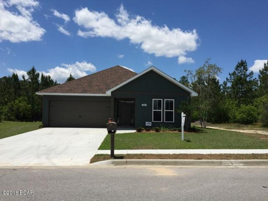 Construction Complete and Ready To Move In!! Just down the road from the H. G. Harders Recreation Complex and Bay Dunes Golf Course. Situated on a .25 acre lot with beautiful hardy plank siding. You will notice the wonderful craftsmanship of a builder who cares! With extensive molding and trim around all of the windows and doors, large accent columns on the covered porch, and gorgeous garage door make your daily return trip to your new home a pleasure! Upon entering the front foyer, style and class surround you with spectacular dark hardwood flooring leading into this fabulous open floor plan. The 2x6 construction has been accessorized with LED recessed lighting to highlight the beautiful granite countertops, tons of cabinetry, stainless steel appliances, and is Construction Complete and Home is READY To Move In!!! Just down the road from the H. G. Harders Recreation Complex and Bay Dunes Golf Course. Situated on a .25 acre lot with beautiful hardy plank siding. You will notice the wonderful craftsmanship of a builder who cares! With extensive molding and trim around all of the windows and doors, large accent columns on the covered porch, and gorgeous garage door! Upon entering the front foyer, style and class surround you with spectacular dark hardwood flooring leading into this fabulous open floor plan. The 2x6 construction has been accessorized with LED recessed lighting to highlight the beautiful granite countertops, tons of cabinetry, stainless steel appliances, and 

island with under mount sink and breakfast bar. No cook is left out of the conversation with the spacious 17'x16' livingroom with recessed electrical floor outlet ready for any furniture layout! Combination dining area leads you through the french doors onto the covered patio awaiting your relaxing morning coffee to watch the sun rise or enjoying a bar-b-que! Interior crown molding and 4" floor molding accent the beauty throughout this home. Enter the large master bedroom onto plush carpet as you get out of bed each morning. Master bath has gorgeous tile flooring, granite countertops on the double vanity, and a magnificent tiled shower with glass door enclosure. Additional bedrooms are nice sized with ample closet space and located by the 6'x7' laundry room and hall bath. All door casings are 3 ft wide for easy accessibility. Builder's pride shows throughout all aspects of this wonderful new place you can call HOME!