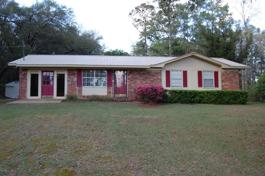 Attractive newly painted and updated three bedroom 2 bath brick home very near college and hospital. Home is situated on one acre with established trees and ornamentals. Home has beautiful screened porch and open deck in the back yard for enjoying the peaceful outdoors. Will not last long during this busy time of year. Call for appointment to see!