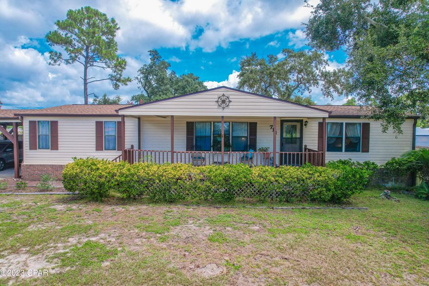 'CURRENTLY UNDER CONTRACT, SELLER ACCEPTING BACKUP OFFERS' Looking for a large , Roomy well maintained home at the beach under $250,000 with lovely large fenced in yard 3 bedrooms , 2 baths with a sunroom! Well here it is!. This permanent  fixed manufactured home has a real red brick bottom complete with front porch and back patio. The roof was new in 2019, New siding 2019, HVAC new in 2018, Water  heater new in 2023. The septic and field lines were replaced new in 2017 , all replumbed in 2010. This home is 1859 square  feet including the sunroom which is heated & cooled and located right off the dining room with easy access through  a sliding door. The home has split floor plan with two large bedrooms with walk in closets and bath on one side and large  Main Bedroom with Main Bath & two closets on the other side. The dining room , kitchen and living area are open and large . A large walk-in pantry could easy be turned into a lock out room if you wanted to do short term rentals here as they are allowed! . The hallway on main bedroom side also contains a large laundry area with a side door that leads out to covered  carport that is large enough for 4 trucks / cars . The back yard is large enough for a pool . Wonderful shade tree  out back along with pond area & shed for all your gardening needs. This home is located off  North lagoon close to lagoon and Gulf . What are you waiting for , Come see this Great home today!