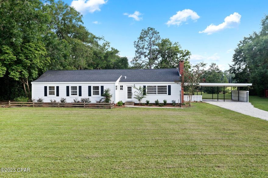 Charm and comfort await you in this newly renovated country style home! This 4-bedroom boast 2 full bath and 2 half bath, fresh paint throughout, luxury vinyl plank flooring, new appliances/hot water heater, electrical/plumbing upgrades, new 5-ton HVAC and additional insulation in the attic. No expense was spared outside with a fresh coat of paint, luscious landscaping, shingle roof installed in 2020 and attached carport. Property is located on a paved road minutes from shopping, restaurants, and schools!