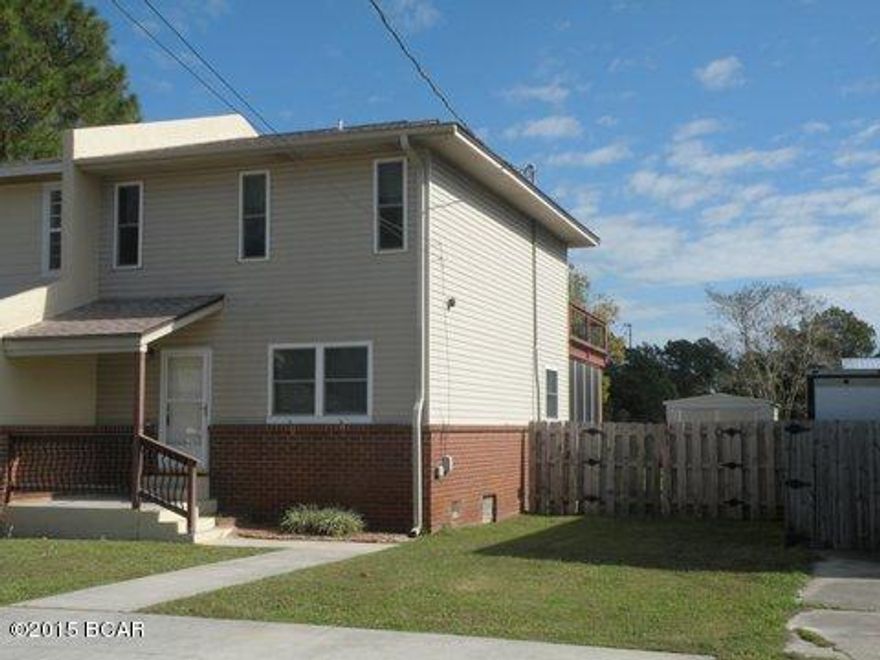 BEAUTY ON THE BAYOU! 2 Bedroom, 2 bath townhouse complete with your own private dock. Recent bamboo floors downstairs, entire interior of townhouse freshly painted. Storage under stairs, and a full downstairs bathroom.  Bedrooms are upstairs with large walk in closets, and a linen closet in the hall.  Master bedroom has a private deck overlooking bayou. Below the upper deck is a screened in porch to enjoy your morning coffee, or bayou breezes, and yes, there is room for a hot tub! HVAC system, roof, water heater, dishwasher , dock & oven/stove recently replaced. Kitchen has Jennaire Stove/oven & side by side refrigerator. Bike barn & ramp is large enough to hold your motorcycle & all your other toys! Only 6.4 miles to Tyndall's AFB Main Gate.