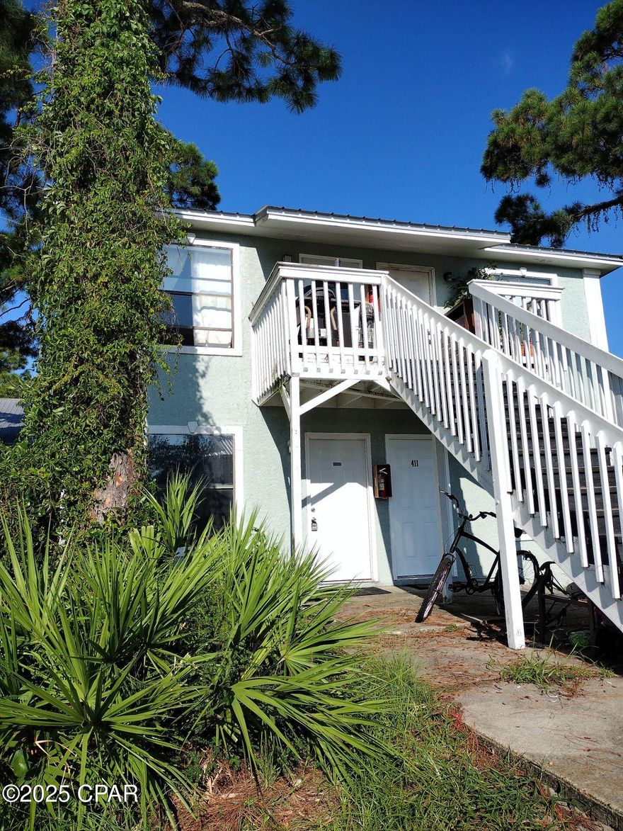 Enjoy the simplicity of beach-side living in this cozy 1-bedroom, 1-bath efficiency unit just minutes from the Gulf! Located off Thomas Drive in the desirable east end of Panama City Beach, this unit offers comfort, convenience, and unbeatable value.

Rent includes basic cable TV, water, sewer, garbage, and lawncare, so you can spend more time soaking up the Florida sunshine and less time worrying about bills. You'll have one assigned parking space per the HOA, and please note — no pets allowed.

Perfectly positioned near St. Andrews State Park, Schooners Beachfront Restaurant, and the Grand Lagoon area with local marinas, dining, and shops, you'll have easy access to everything that makes Panama City Beach special. Whether you're watching sunsets over the Gulf or grabbing coffee at a local café, this quiet coastal spot keeps you close to it all.

Simple. Serene. Steps from the best of PCB. Come see why this unit is the perfect place to call home!