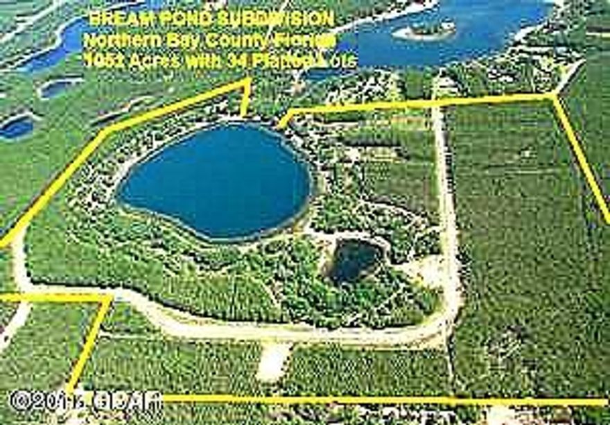 BREAM POND 1.7 ACRE LOT-OWNER FINANCING AVAILABLE-10% DOWN/20 YEAR AMORTIZATION/9% INTEREST/5 YEAR BALLOON-ATTENTION BUILDERS and DEVELOPERS - This is a Dream Property ready to BUILD-OUT. 40 separate parcels in a complete Subdivision surrounding and including Bream Pond in Northern Bay County. All Platted, Paved Roads, Underground Electric. With all of the recent Growth in the Sand Hills portion of Northern Bay County, this property is ready-to-go. This property is about 1/2 mile East of Hwy 77 and 1/2 mile South of Hwy 20 making it a very convenient location. Bream Pond is a Beautiful approximately 30 Acre Lake that is known for it's fishing. It has clean clear water and a white sand lake bottom making it a desirable Lake for swimming, kayaking , jet-skis and other water activities.