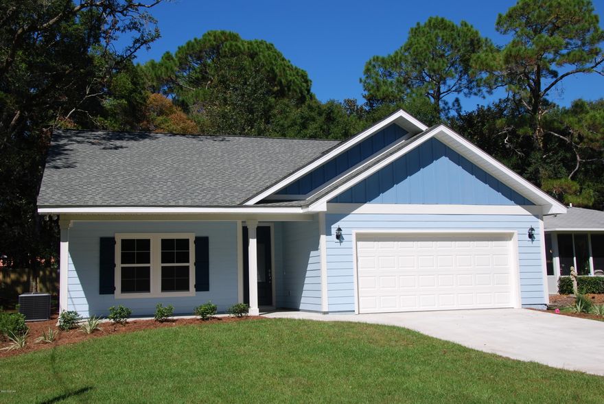 BRAND NEW HOME steps away from the bay and a short driving distance to Panama City Beach, you will be welcomed by this attractively designed home nestling in the shade provided by a number of giant age old trees. Professional landscaping further enhances the appeal. As soon as you walk through the eight foot high front door you immediately recognize the many outstanding features of the free flowing floor plan, which cannot be found in most other homes in the St. Andrews area: ten foot high ceilings, two-panel “Cheyennne” style interior doors, and pseudo wood floors throughout the living areas of the home. An open plan kitchen with granite countertops, stainless steel appliances and an eye-catching tiled backsplash are sure to impress the cooking enthusiast.  The master bedroom features a double marble top vanity, a tiled shower, as well as an oversized walk-in closet. Faucets and door hardware throughout the home have a brushed nickel finish. The sliding glass rear door opens onto a spacious covered porch and secluded rear garden, perfect for those barbecue evenings and entertaining.  One small dog OR one small cat is permitted following the non-refundable pet fee of $250.  Lease agreement subject to a background and credit check, subject to Owner's approval.