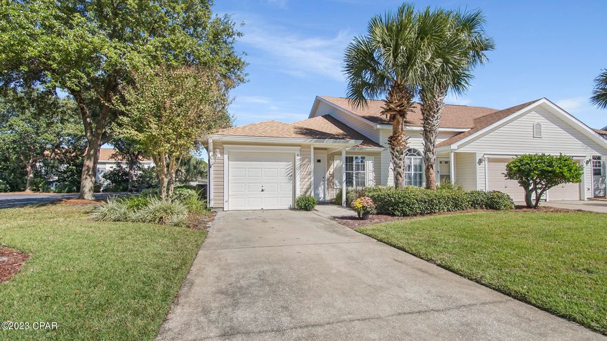 Nice end unit townhome located in the Palmetto Trace Subdivision right across the street from Pier Park in Panama City Beach. This unit features 2 nice size bedrooms (primary bedroom has attached full bathroom), spacious living room, dining area and two full bathrooms. You'll love the open floor plan and space in this townhome. Townhome comes equipped with a full size washer and dryer. Enjoy the nice back patio and grass area for your pets. The townhome is pet friendly with a deposit and you'll love the close proximity to the community pool. Freshly painted on the inside, new backsplash in the kitchen and laminate flooring throughout. Come live the maintenance free lifestyle in PCB!