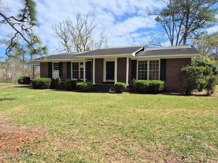 Brick home in the heart of Chipley and close to schools and shopping.  Two spacious bedrooms with ample closet space.  Kitchen has a breakfast bar, lots of cabinet space, and comes with stove, refrigerator, and dishwasher.  Large living room attaches to the formal dining area.  There is a separate den with a bonus room on back for extra space.   Laundry room has a washing machine. There is a storage shed in the back yard for your storage needs.  Has established grape vines on the property and nice landscaping.  Also has a large chain link dog pen.   Located in a quiet area at the end of a paved city street and only one hour to Panama City Beach.