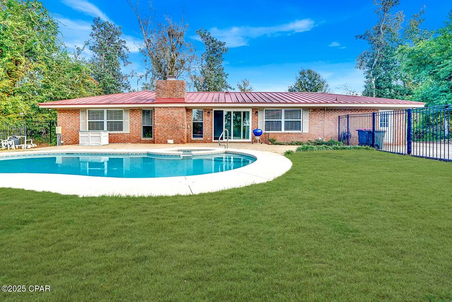 Welcome to your ideal lakeside getaway or residence where comfort meets luxury. This stunning 3-bedroom, 2-bath  home sits on a large lot, offering plenty of space to relax and entertain.  The newly remodeled kitchen is a chef's dream with stainless appliances, granite countertops, with plenty of cabinets to meet all your cooking and storage needs.  The home boats of a thoughtful,  spacious open floor plan with a cozy living room complete with a fireplace and water views from all rooms, creating the perfect atmosphere for relaxing at the end of the day. The large master bedroom offers his and her closets and a peaceful retreat, while the heated bathroom floors in both bathrooms add a touch of luxury.  The home also includes a large garage and workshop, ideal for hobbies, storage, or projects. The property also features a private boat dock, perfect for lake enthusiasts, and a sparkling pool to enjoy sunny days .  Nestled in a quiet, serene area, the house offers privacy while being only 1/2 mile from the boat ramp, making it easy to enjoy all that the lake has to offer.