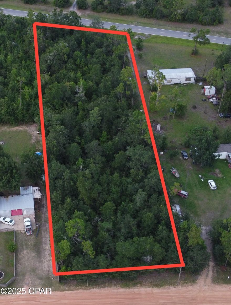 1.1-acre lot located in the peaceful rural community of Youngstown, FL. This property features a septic system and water connection already on site (buyer to verify condition and permitting with Bay County). Zoned for mobile homes and manufactured housing, this is a great opportunity for a full-time residence, investment, or future build.

Enjoy quiet surroundings while still being within easy reach of Panama City, shopping, and local recreation. Owner financing available.