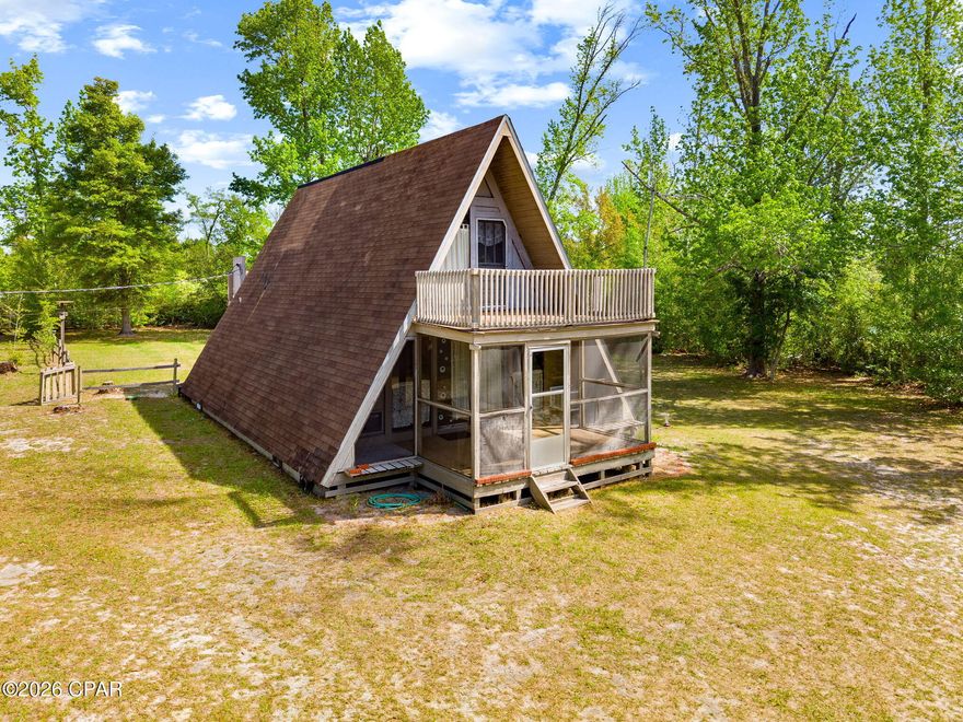 Tucked away on 2.7 acres along the beautiful shores of Gainer Bayou, this private gated property offers the perfect blend of space, functionality, and waterfront living. The 2-bedroom, 2-bathroom home sits on a serene piece of land with peaceful bayou views, creating an ideal setting for full-time living or a relaxing weekend retreat.
Inside, you'll find a comfortable layout with plenty of natural light and views of the water, while outside is where this property truly shines. The fully fenced backyard provides privacy and room for pets or entertaining, and the detached 2-car garage/workshop offers ample space for storage, tools, or hobbies.

Whether you're enjoying quiet mornings overlooking the bayou or taking advantage of the acreage for outdoor living, this property delivers a rare opportunity to own waterfront land with room to spread out. With gated access, usable land, and direct Gainer Bayou frontage, properties like this don't come around often--schedule your showing today.