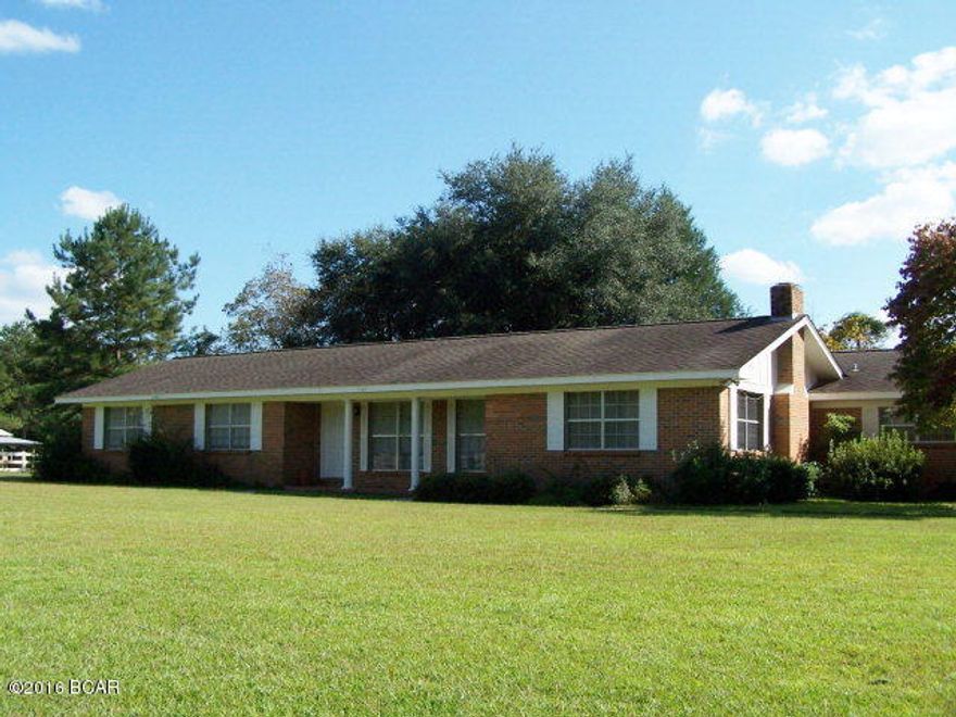 Country Living in a VERY WELL maintained home. This home has 1990 living sq ft, Brick exterior, 2 or 3 large bedrooms. The Large Family Room with wood burning fireplace could easily be converted to a Master suite. The spacious formal sitting and dining area has the kind of carpet you want to take your shoes off and walk around on. The home has C/E Heat/Cool, pocket doors, folding doors, updated kitchen and appliances, large breakfast eat in area, 2 car attached carport with 4 x 15 storage space for freezers ect. A new survey has been completed on this well landscaped 1.3 acres and available for you at closing. This home is in move in condition, perfect for a starter home or retirement home and once you see the home you will recognize the pride in ownership that has taken place in this home and by this family. Please click on to see more pictures.