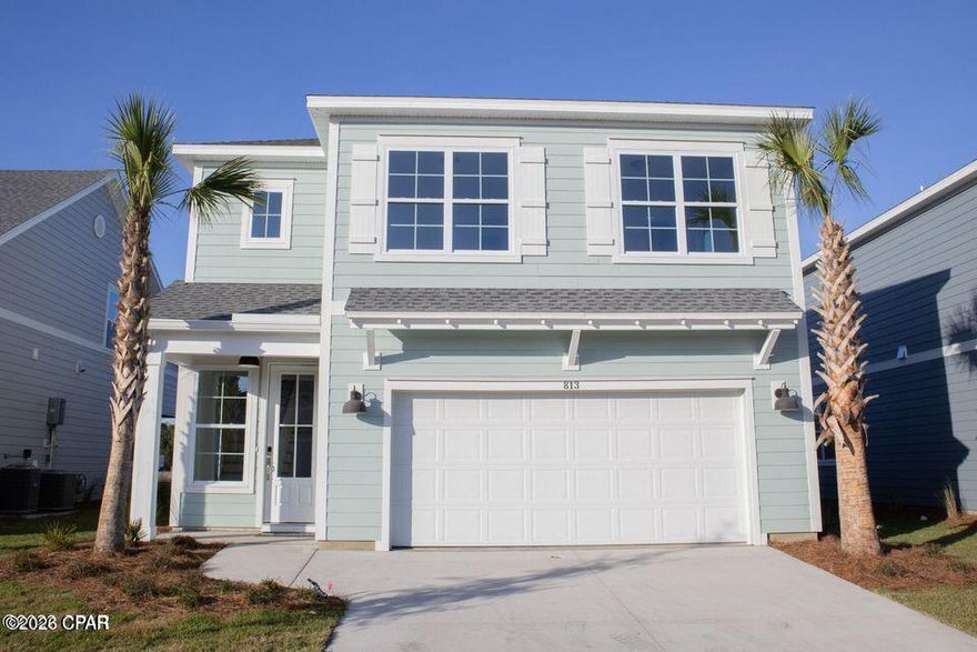BREAKFAST POINT! Centrally located to the beach, shops, dining and much much more: This 5 bedroom 3/5 bath home is located in the community of Breakfast Point and features tile and LVP flooring downstairs, ground level primary suite, stainless steele appliances, 2 car garage and 4 bedrooms and 2 full baths upstairs. Other features include granite/quartz countertops, gas stove, and stainless-steel appliances. Exterior features cement board siding with a 2 car garage.