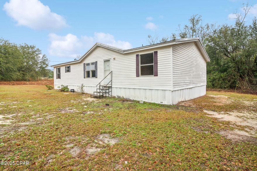 Investor Special! Contractor's Dream! This 3-bed, 2-bath double-wide sits on a spacious 1-acre lot with no restrictions, offering endless possibilities at a great price. A true fixer-upper, this property is perfect for those looking to renovate and make it their own, or take advantage of the land to build a dream home. It's also a great investment opportunity—fix and flip, hold as a rental property, or develop to maximize potential. No HOA, no limitations, just opportunity! Don't miss out—schedule your showing today!