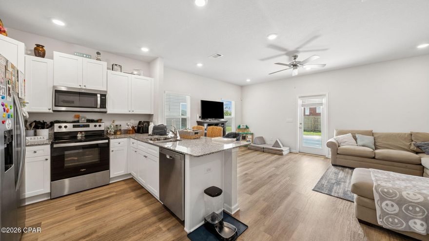 Welcome to Jake's Landing Townhomes in Lynn Haven, Florida, a move-in ready exterior townhome offering exceptional value, modern finishes, and a convenient location near Panama City Beach and Tyndall Air Force Base.
There is a potential assumable FHA loan available, subject to lender approval and buyer qualification, offering an opportunity for qualified buyers to assume an existing mortgage with favorable terms.
This well-maintained 3-bedroom, 2.5-bathroom townhome with a 1-car garage features durable Hardie board siding with ColorPlus exterior, a Prairie-style front door, and dimensional shingles with a 30-year transferable warranty. The fully sodded and cleared yard, steel garage door with opener, weatherproof outlets, and exterior hose bib provide added convenience and functionality.
Interior features include an open-concept floor plan with luxury EVP flooring throughout the main living areas, a spacious living room, and a seamless flow into the kitchen and dining areas. The kitchen and bathrooms are finished with granite countertops, white cabinetry, brushed nickel hardware, and a full stainless steel appliance package including stove, microwave, dishwasher, refrigerator, and a white washer and dryer.
Additional features include energy-efficient heating and cooling systems, insulated windows and screens, ceiling fans in the living room and primary bedroom, and blinds installed throughout the home for added privacy and comfort. A 10-year transferable structural warranty is also included, providing long-term peace of mind.
This property is located in desirable Lynn Haven with convenient access to shopping, dining, schools, hospitals, and major employers including Tyndall Air Force Base. The home is approximately 20 minutes from the white sandy beaches of Panama City Beach.
A pond is located directly across the street, offering a pleasant natural view and added sense of space and tranquility.