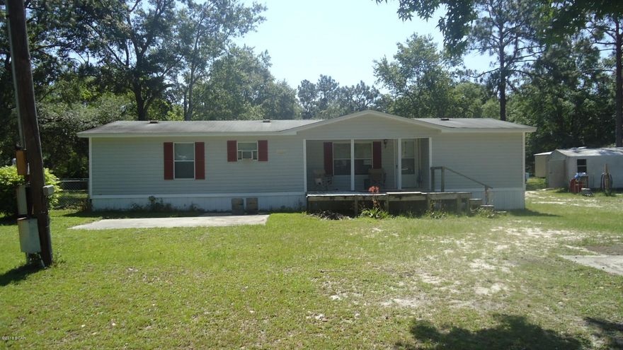 LOOKING FOR THE PEACE AND QUITE OF THE COUNTRY BUT STILL CLOSE TO EVERYTHING. LOCATED ON A PAVED ROAD.THIS HOME IS IN GOOD CONDITION WITH LOTS OF SPACE.LIVING ROOM HAS A NICE CORNER FIREPLACE. LIVING ROOM,KITCHEN AND UTIITY ROOM HAS CERAMIC TILE FLOORING.SPLIT BEDROOM PLAN.PROPERTY HAS A STORAGE SHED AND A CARPORT. MAKE YOUR APPOINTMENT TODAY TO SEE THIS HOME.