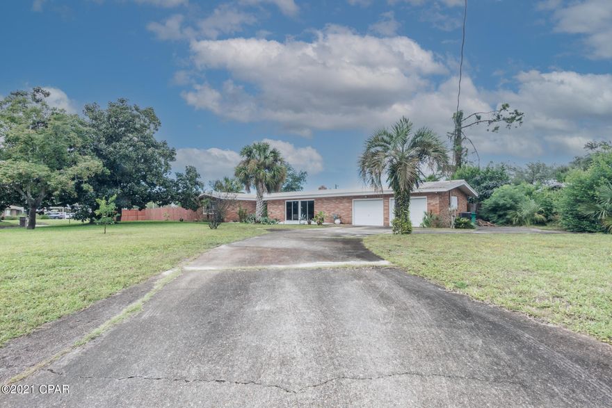 UNDER CONTRACT .Seller taking BACK UP Offers .Wonderful Large Home in the quiet Woodlawn Neighborhood.

SHORT walk to the Bay !

Large Rooms as this home built in 1960 .

convenient to the Beach , Thomas Drive and Over Hathaway Bridge destinations.

 HVAC is 7 years Old, Metal Roof (2010) Water Heater Just replaced . Total Electric with a Wood Burning Fireplace  Fireplace .

LARGE Pool with a Super Back yard

Entertainment area.

36x18x8' deep Chlorine Pool

Please measure all sizes if Important