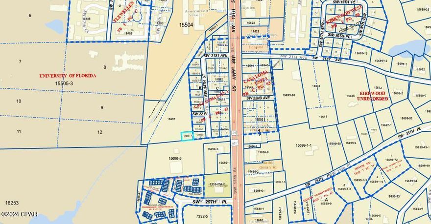 The parcel is located within the U8: Urban 8 zoning district with endless uses.  The list of uses is available.  The property has been surveyed and there is a deeded easement to this property.  The property is still wooded and undeveloped.  It's ready to be transformed into what fits your needs. Not many parcels of this size in the area are available for sale.  Close drive to US Hwy 441 / SW 13th St.  Property adjoins Lake Shore Towers and is right down the road from Shands Hospital.