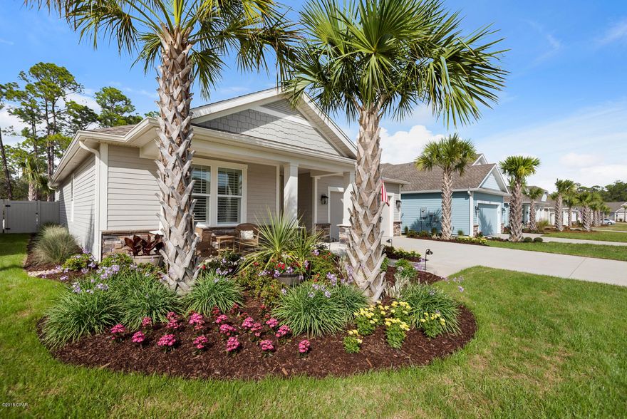 Come see what $35K in upgrades can do for you! This gorgeous Mako floor plan is located near the back of the neighborhood on a beautiful lot that offers amazing views of the trees and pond with no other houses/neighbors behind you. There are simply too many upgrades to list but some of the highlights include quartz countertops, high-end cabinets, GE black slate appliances and cabinet lighting in the kitchen. The master suite features an upgraded tub and frameless shower door opening to a custom tile shower.  The backyard is fenced for privacy and features a spa/hot tub that conveys. The entire house is tiled and includes custom plantation shutters and crown molding. Whisper Dunes offers a wonderful pool amenity and is close to both Pier Park and 30A. HOA includes mowing.