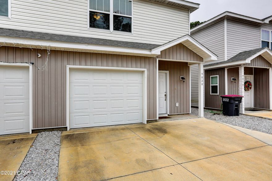 CURRENTLY UNDER CONTRACT, SELLER ACCEPTING BACKUP OFFERS. Don't miss this 3 bedroom, 2.5 Bathroom home. Spacious, clean and well kept. This one is a must see. Built in 2018, this townhome offers 1,476 sq. ft heat/cooled. Upstairs has all new premium laminate flooring throughout. Three bedrooms are upstairs, including a, huge master bedroom, master bathroom and full guest bathroom. Connected to the Master, you'll find a large walk-in closet and a master bathroom with a step in shower, double sinks and a granite countertop. The 2nd and 3rd bedroom also offer plenty of space. The full guest bathroom also features granite surfaces and a shower/bathtub. Linen closet outside of the guest bathroom, and a big laundry room behind double doors at the top of the stairs. Downstairs features premium laminate flooring throughout. The kitchen offers plenty of counter space and opens to the dining area and a large living area. The kitchen also features granite countertops and plenty of cabinet space. The bar area offers more seating for dining or entertainment, opening into the living area. Stainless steel kitchen appliances include oven/stove, dishwasher, over-stove microwave, In sink garbage disposal, water purifier and refrigerator. Vertical Pantry to the left of the refrigerator. Up the hall, you'll find the half-bath, hallway closet and the entrance to the garage. Remote controlled garage doors open to two additional designated parking spots giving you up to 3 designated parking spots. Just across the street there is overflow parking available. This one is going fast so do not wait! Schedule a private showing with your favorite Realtor today!