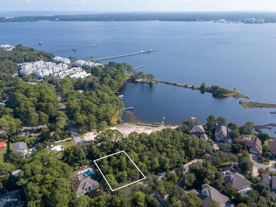 Lovely wooded lot to build your dream home in the prestigious gated community,''The Preserve On The Bay''. This much sought out area is located in a tranquil setting, yet a short drive to all of the action on the beach. Also, Bay Points exclusive golf course is just down the street! This gated community also offers 24 hour security, and grounds keeping. These lots do not come available often. Don't miss out!