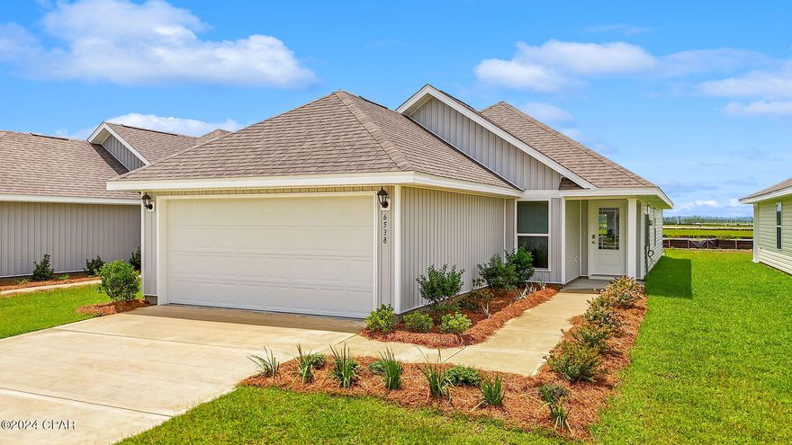 Welcome to Liberty. This home is ready for quick move in. This Celeste floor plan is located at 6538 Canley Court. Featuring 3-bedrooms, 2 full bathrooms, and 1427 square feet, this home has an open concept floor plan. Interior features of this home include EVP flooring in living and wet areas, granite countertops, stainless kitchen appliances which include a stove, microwave, and dishwasher. The kitchen features a breakfast bar area with room for seating. The primary bedroom is located at the back of the home and features a large closet with an ensuite bathroom with dual sink vanity and large shower. The laundry room and additional bedrooms are just off the living room. This home is a must see. Like all homes in Liberty, the Celeste includes a Home is Connected smart home technology package which allows you to control your home with your smart device while near or away. Liberty neighborhood is conveniently located in beautiful Panama City off Star Avenue near 231. Located just 25 minutes from Tyndall Airforce Base, 20 minutes to hospitals, and less than 15 minutes to shopping, restaurants, and grocery stores you will be amazed at the convenience once you enter the winding entrance to this beautiful sanctuary. Liberty, D.R. Horton's premier new lifestyle community, offers a 7,500 square foot community center with full gym, wellness rooms and much more. Additionally, behind the community center is a water wonderland with resort style pool, splash pads, and an outdoor grilling kitchen with seating.