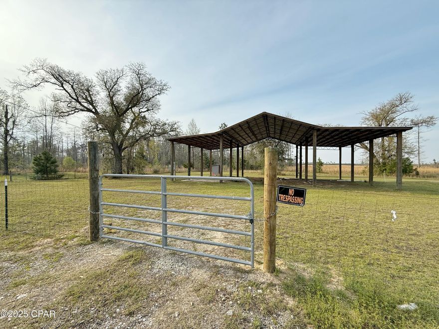 Unlock the potential of 36 acres of prime land, just a few minutes south of Marianna, FL, with easy access via a paved road! This property offers a fantastic opportunity, featuring a large pole barn, well, septic system, and power pole already installed—everything you need to get started right away. The majority of the land is already cleared, providing a ready-to-use canvas for your next project.

The front of the property is fully fenced and gated, ensuring both privacy and security, while an additional fenced pasture offers space for livestock or recreational activities. Enjoy the peaceful serenity of your very own fishing pond, perfect for unwinding after a long day.

With its convenient location just minutes from Marianna and all the amenities you need, this property is ideal for anyone looking to build, farm, or simply enjoy a peaceful retreat. Don't miss this rare opportunity to own a piece of land with endless possibilities!
