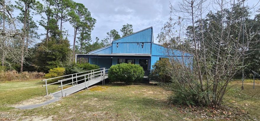 Check out this Diamond in the rough. With a little vision this home can be the perfect home for you!! Located in Alford Florida, just north of Panama City in Jackson County is this 3 Bedroom 2 Bath home sitting on 1 acre. Enjoy the winter mornings sipping coffee on the covered front porch listening to the birds sing. Situated in Compass Lake in the Hills on a quiet street. Easy access to Panama City Beach where we have the Worlds Most Beautiful Beaches. Or just a short distance to the I-10 Corridor for easy traveling. This home can be your full time residence or private enough to be your second home away from home. Or make this the perfect get away Airbnb. Compass Lake in the Hills offers boating, fishing, pool and other amenities if you choose to join the HOA for $135 annually. Call today for more information.