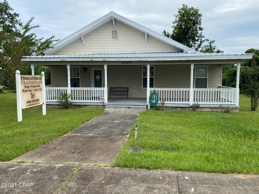 This 2105 sf commercial office could be used as a residential as well. It has a full kitchen, three half baths, 8 separate rooms, alarm, brand new 40 year warranty metal roof, city water and sewage, fully repaired central unit, Hardie Board siding, wood and tile floors, huge lot, large front porch and located in the heart of Marianna. Close to all!