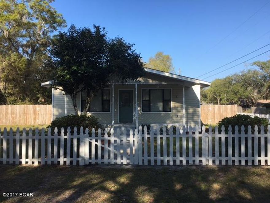 Cute 3/2 home with front porch and white picket fence on a corner lot w/ big fenced back yard. Nicely updated, excellent condition. Washer/dryer included. Storage shed. No pets.