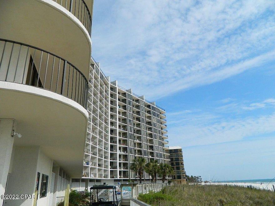 Renovated 2-story Penthouse with 2 Gulf-Front Bedrooms! Turn-Key Condo at popular Edgewater Beach Resort. Fully Furnished. Open living room with balcony. Gulf-Front Master Suite features floor-to-ceiling windows, en suite bath with tile shower, balcony access. Fun spiral staircase leads to a secluded sleeping loft with wet bar, bath and incredible 600sf roof-top deck! New Washer/Dryer 2015, AC/Water Heater 2014. This condo sleeps 7. Gated, Building-Side Parking, Golf Club, Tennis, Basketball, Gym. Kids Club. Lagoon Pools, Hot Tubs, Splash Pad, Sun Decks. Restaurant & Bar, Market, Pizza. Owner's Pets ok. Onsite Tram. Walkable to dining, shopping, entertainment. Trolley to Pier Park. Come find the Coastal Lifestyle of your dreams!