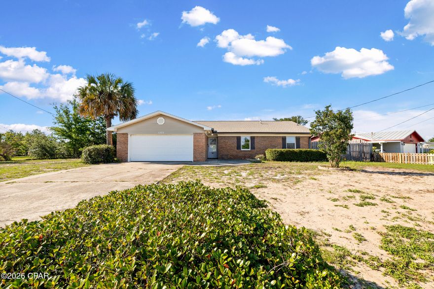 OPEN HOUSE SATURDAY 5/30 10AM - 12PM. 
Welcome to 1525 Donna Avenue in Parker, FL--a charming, traditional brick home offering comfort, convenience, and a true taste of coastal living.

Tucked into an established, no-HOA neighborhood, this well-built home carries timeless brick character paired with a warm, inviting feel the moment you arrive. Inside, the layout is comfortable and easy to live in, offering a sense of space that feels familiar and welcoming. A dedicated dining room adds a feature you don't often find in newer builds, creating a natural place for gathering, meals, or work space. The electric fireplace serves as a cozy focal point in cooler months, while still adding subtle charm and character year-round. You'll also enjoy a new gas water heater and less than 3 year old HVAC. 

One of the standout features is the glimpse of bay views, offering just enough water in the distance to remind you how close you are to the coast--where sunrises, sunsets, warm breezes, and that easygoing coastal rhythm are part of daily life rather than just a weekend escape.

The location is especially convenient, just about 13 minutes from Tyndall Air Force Base, making it ideal for military, civilian, or investment buyers who want quick access to the base while still enjoying a quieter residential setting. The neighborhood also reflects a relaxed, established feel, home to many retired veterans and long-time residents who value its steady, down-to-earth atmosphere.

Just nearby, you'll find Under The Oaks Park, a local favorite featuring a classic playground, walking path, disc golf, picnic areas, and beautiful bay views beneath sweeping, moss-draped trees. For those drawn to the water, Smugglers Cove Marina and Gulf Oaks RV Park make boating, fishing, and waterfront weekends incredibly accessible.

Everyday convenience is close at hand with dining, shopping, and local favorites throughout Callaway and Panama City. The area continues to grow in a thoughtful way, with new coffee shops, restaurants, and grocery options joining long-standing staples. Revitalized downtown Panama City along Harrison Avenue is just a short drive away, offering even more options for dining, shopping, and entertainment. And when you're ready for the coast, the white sand beaches of Panama City Beach are only about 30 minutes away.

This home blends traditional brick durability, a welcoming neighborhood setting, and a location that connects you to both nature and convenience. Whether you're searching for your first home, an investment opportunity, or a place to settle into a steady coastal lifestyle, let this one be your comfortable, inviting place to land with just the right touch of coastal charm.