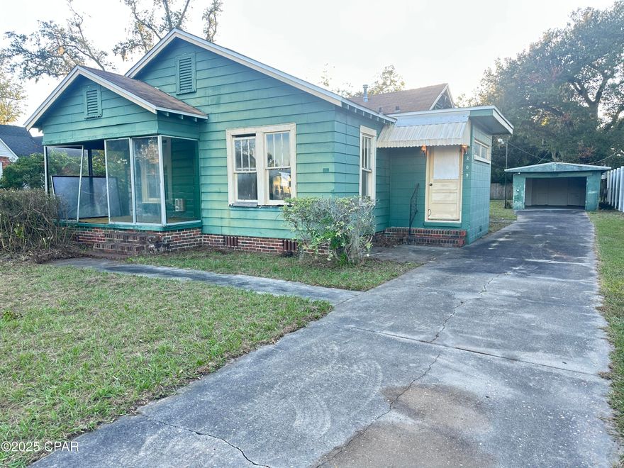 Located in the heart of The Cove, this charming home sits on a spacious lot with both alley and Cove Boulevard access. Just minutes from historic downtown Panama City, the marina, shops, and restaurants, you'll enjoy the perfect blend of convenience and neighborhood charm.

The solid concrete block construction provides peace of mind, and the oversized one-car garage offers ample storage along with plenty of additional driveway and parking space. Permit history reflects a new roof in 2019, and both the electrical and plumbing systems have been updated at some point, adding to the home's value.

Brimming with Southern charm, the covered front porch is ready to be enjoyed as-is or easily screened in for year-round comfort. While currently configured as a two-bedroom, the spacious family room can easily serve as a third bedroom if desired.

This home is full of potential and nestled in one of Panama City's most desirable neighborhoods—don't miss this opportunity to make it your own!

Owner Occupants are given first priority review.