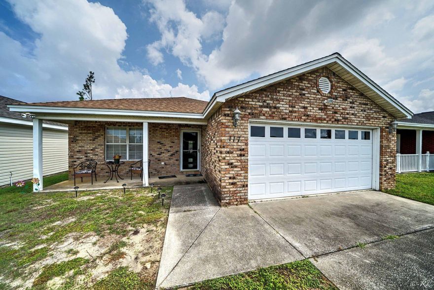 Centrally located, affordable home! This hidden area of Lake Marin is just a short distance from Hwy77 or 23rd St Across from the lake This charming home has a nice outside sunroom and fenced yard. The master has a nice sized walk in closet. Open living/dining area. 2 car garage. New roof!