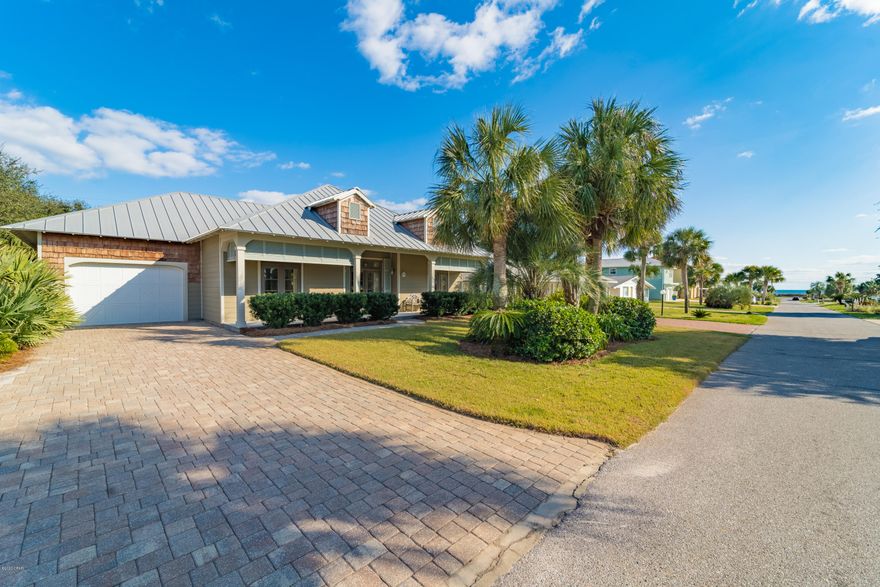 Exquisite, custom home in my favorite west end Santa Monica Beach community. Only a few hundred feet from your own private beach. This home offers many incredible features including James Hardie siding, hurricane rated Anderson windows & doors, underground propane tank, saltwater pool & tankless Rinnai hot water. Driveway, walkways & backyard are constructed of pavers. The interior boasts 10' ceilings (except 17' pine with cedar beam vaulted living room ceiling), European ceramic tile throughout. Wood burning fireplace on screen porch. The kitchen is a dream with all Viking Appliances, granite counters & island, and walk-in pantry. All bedrooms and living areas have doors that open to patios. The extras make this home a pure delight! The home & its location are spectacular and very special