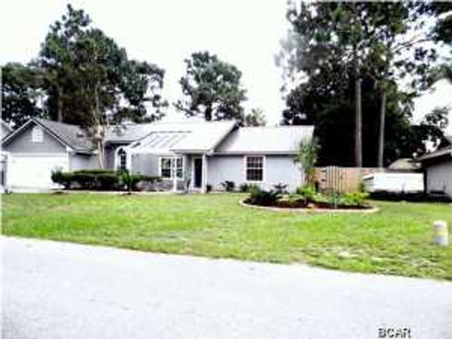 Beautiful Home in a Quiet Neighborhood in Treasure Palms with a new Metal Roof has a split bedroom plan. Large Great Room has an Open Floor Plan with Cathedral Ceilings, Laminate Hardwood Floors and Fireplace. Master suite has large walk in closet, (12.5 feet by 6 feet). Other two Bedrooms are Good size Bedrooms. Seller have Painted all Cabinets, exterior and interior walls. They have replace the Water Heater (this year), Refrigerator, Microwave, Sink and Spout. The bathrooms updates include all Hardware: Knobs, Handles, and Spiral Door Handles. French doors opens to the screened back porch with a Hot Tub which is great way to relax. Nice big back yard with a privacy fence and a Sprinkler System. The spacious laundry room has plenty of room for a freeze or whatever extra room you