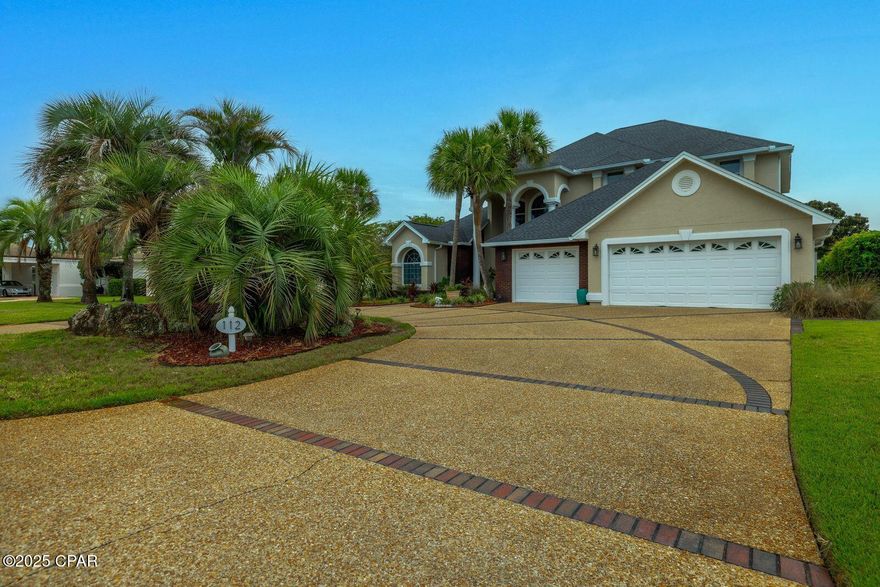 Gorgeous executive home located in the Exclusive Gated Community of   Legend Lakes, Jack Nicklaus Golf Course. Take a look at this fabulous home full of character, craftsmanship,  and personality throughout. This home is close to 4000 sq. ft, and fully remodeled interior and exterior in 2019/2021. Everything in the home to include appliances, ac, roof is close to 5 years old.  Home features a family room, bonus room, formal living room, 4 bedrooms, 5 bath and Mother In Law Suite on the second floor.  As you approach the custom paved circular driveway, you are greeted by charming character at the entrance with high pillars and custom doors.  Entering the Foyer, your formal dining will be on the right next to the lavish stair case, and plenty of natural lighting.  A formal living area with French Doors and views of the pool and golf course.  Taking a left you will enter the large master on the 1st floor, with Trey Ceilings and French Doors exiting to the hot tub and pool.  The master bath has a shower, large jetted tub, three sinks and oversize closet.  Crown molding throughout, 22' high family/dining room ceilings, stately columns, and numerous updates and custom half bath.  Interior completely remodeled with new flooring, lighting and fixtures. The kitchen is unbelievable with white cabinets, blue pearl granite counters, mosaic back-splash, stainless-steel appliances with double oven and gas stove and double sink.   Large breakfast bar can accommodate seating of 6.  New built in surround system, 72-inch electric fireplace and 82' tv.  Additional large guest room on the 1st floor with its private exterior entrance. Second floor has a large bonus /family room with full bath and guest rooms.  Mother-in-Law suite room has also a full bath, bedroom and living room.  Craftsmanship throughout with arched hallways and balcony.  Oversize 3 car garage with golf cart storage.  The back yard is beautifully landscaped and extended cool deck patio. Brand new $8000 hot tub to convey with sale depending on offer. Plenty of privacy on both sides of the home.   Exterior half bath and shower.  Patio is oversize and includes natural gas for your grill.  Sprinkler system throughout and fully fenced in.  Sitting outside you can watch the sunrise and sunset and pristine views of the golf course in the evenings.   Located near shopping, beaches, St Andrew State Park and best restaurants in the area.  Golf membership not required and new renovated marina for those boat lovers.  This home has it all and best of all, still has the new wow factor look with craftsmanship throughout and no wear and tear. Low HOA and yes on short term rental.