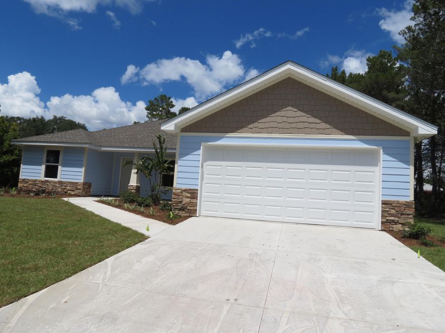 ***Reduced Price! Home is completed & C.O. was issued September 22, 2016.*** If you are looking for a brand new 4 bedroom, 2 bath home on a very large lot, in a nice, quiet neighborhood in Panama City Beach, look no further! This home is located a block away from beautiful Lake Powell Boat Ramp and all of it's amenities, a mile away from Camp Helen State Park and a mile from our stunning white sandy beaches! This beautiful, custom built home is designed with a split bedroom plan w/ very large rooms. This home sits on a nice sized 83 x 132 lot and has many great features and upgrades. As you enter the front door, you will notice the large 10ft ceilings in the living room, formal dining room, and spacious kitchen. The kitchen has lots of counter space w/ a breakfast bar, beautiful cabinets, and granite counter-tops. The kitchen also offers a nice 4 piece stainless steel appliance package to include a side by side refrigerator, stove, microwave and dishwasher. There is also an eat in breakfast area over looking the backyard. Beautiful porcelain, brick laid, 12x24 tile can be found throughout the living room, formal dining room, kitchen, laundry room and bathrooms. All 4 bedrooms have high quality frieze carpet. The master bedroom is very spacious w/ boxed ceilings, and a very large walk-in closet. The master bathroom offers a 72 inch double vanity w/ granite counter top, a large garden tub to enjoy a relaxing bath, and a separate tiled shower. The 3 additional bedrooms are located on the other side of the home and each offer lots of room to handle large furniture w/ spacious closets. There are many other desirable features to include: A large two car garage, all electric central heat and air, separate laundry room, manicured yard with irrigation system, and large covered, back and front porch areas. This terrific home is centrally located on the beach, close to the beautiful beaches, Pier Park, and many restaurants! You definitely want to put this on your list of homes to see today! Builder is offering a 1 year builder's warranty that is transferable.