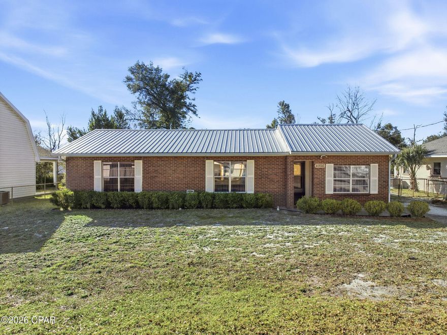 Welcome to a solid, well-maintained block construction home with a timeless brick exterior in the heart of Panama City! This classic and dependable residence offers a wonderful opportunity—featuring city water and city sewer (no well or septic!), and because the lender will not require flood insurance, this property provides added peace of mind and affordability.

Step inside this comfortable 3-bed, 2-bath home boasting an intelligently functional layout with approximately 1,345 square feet of living space. Built with durability in mind, the sturdy block and brick construction speaks to longevity and low maintenance, both inside and out.

Prime Location & Convenience:
• Located within ¼ mile of Parker Elementary School, making morning drop-offs and afternoon pick-ups a breeze for families.
• Easy access to major routes and local services.
• A short distance from shopping, dining, parks, and everyday essentials.

Practical Utilities & Features:
• Block construction with attractive brick exterior—built to last.
• Well maintained by current owners.
• Served by city water and city sewer (no private systems).
• Lender will not require flood insurance, saving you expense and hassle.
• Metal roof adds durability overhead.
• Comfortable interior finishes and a welcoming floorplan.

Location Highlights & Distances:
• Tyndall Air Force Base: Approximately 5-6 miles, making this home ideal for military personnel, families, or contractors stationed at Tyndall AFB.
• Northwest Florida Beaches International Airport (ECP): Around 22-25 miles (about 30-35 minutes), offering convenient regional and national travel options.
• Closest Emergency Room: Quality emergency care is nearby, including facilities such as HCA Florida Panama City Emergency, located within just a few minutes' drive for prompt medical attention in urgent situations.

Whether you're a first-time buyer, investor, or looking to downsize, this home delivers structural reliability, everyday convenience, and proximity to key Bay County destinations. Don't miss your chance to own a property that combines solid construction, low-maintenance living, and location appeal in a desirable Panama City neighborhood!