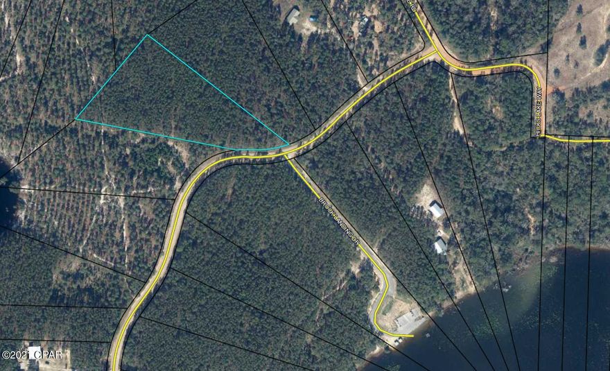 Hicks Lake is a spring-fed lake of approximately 300 acres with plenty of space for fishing and water skiing. The public boat ramp is within very close proximity to this lot. The lot features pretty hardwoods and pines with plenty of room to carve out your own oasis. Drive by and take a look any time! Easy access to the Beach, town and schools.