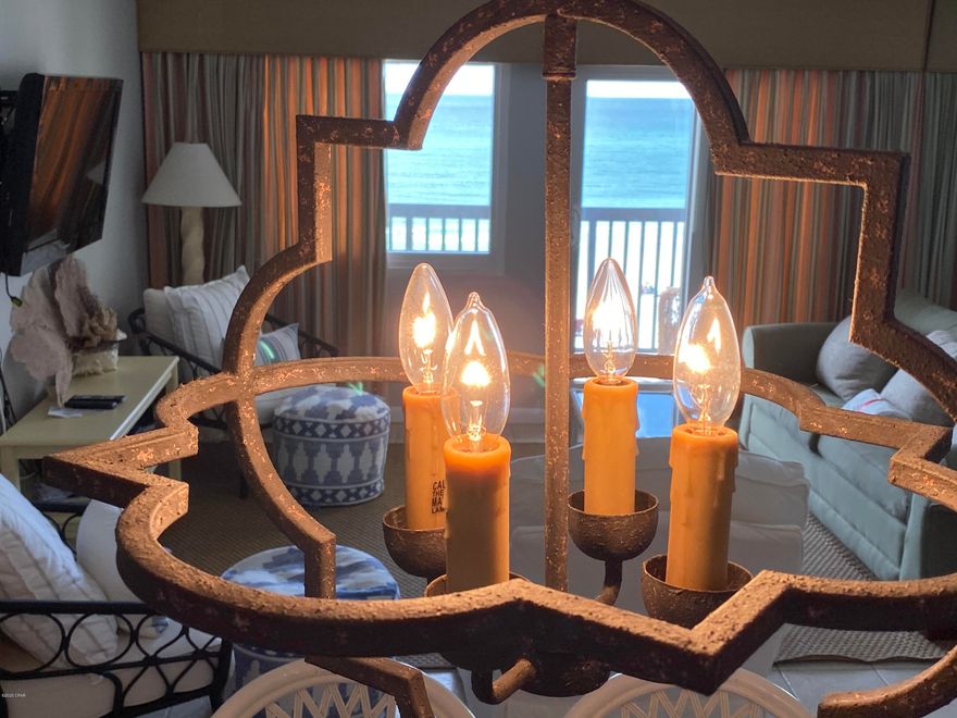 This amazing gulf front condo is located on the fifth floor of the C1 Building, which gives stunning gulf views! This spacious unit has gulf views from nearly every room, beginning with the open kitchen, dining and living rooms, the master bedroom and master bathroom and then views of Lake Powell from the guest bedroom! Pinnacle Port is a great community with fabulous amenities, including a gated entrance, two pools, one of which is an indoor/outdoor pool that sits on the gulf. There is also a dock, a boat ramp with 26 boat slips, kayak and paddleboard rentals, shuffleboard, tennis courts and a playground for the kids! This would make a great primary, secondary or vacation rental home! Being sold fully furnished with a small exclusions list. Please verify room dimensions if important.