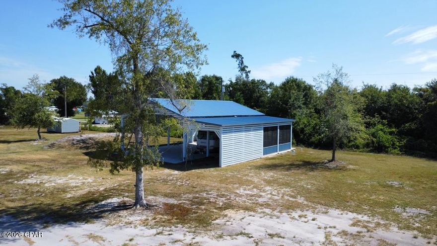 An excellent opportunity to own a versatile property just under 1/2 acre on desirable Firehouse Lane in Port St. Joe, located only blocks from the Intracoastal Waterway, boat launch, and some of the area's best fishing. This property offers a functional setup ideal for immediate use or future expansion.

The property features a spacious pole barn, perfect for covering your RV, boat, or equipment, along with existing RV hookups for added convenience. A studio is currently under construction and planned to include a bathroom, kitchen, sleeping area, and living space--offering great potential for guest accommodations, rental income, or a private retreat once completed.

A small shed is also included and provides additional storage or the opportunity to convert into a workshop or additional usable space. Whether you're looking for a weekend getaway, investment opportunity, or future homesite, this property offers flexibility to fit your vision.

Enjoy the quiet coastal lifestyle with a short drive (approximately 5 miles) to Mexico Beach for boating, fishing, and beachside relaxation. Gulf County allows RVs, mobile homes, or site-built homes, making this a prime location for your next venture.