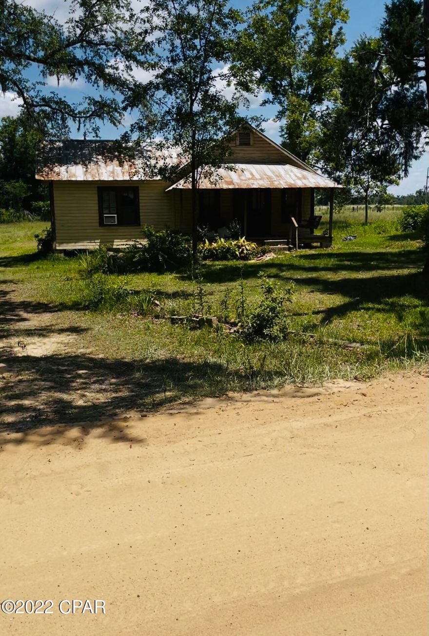 Old farmhouse on 3 acres, needs TLC.